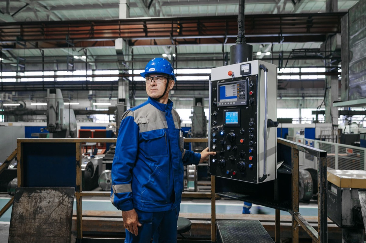 Smart manufacturing plant UK with automated machines and digital control panels