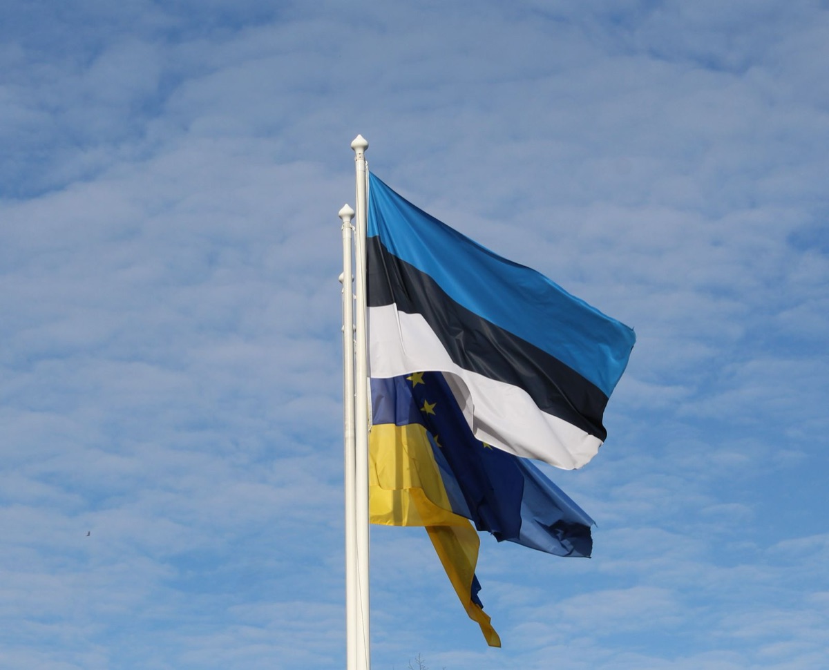 eu flag and uk flag intertwined in historic document