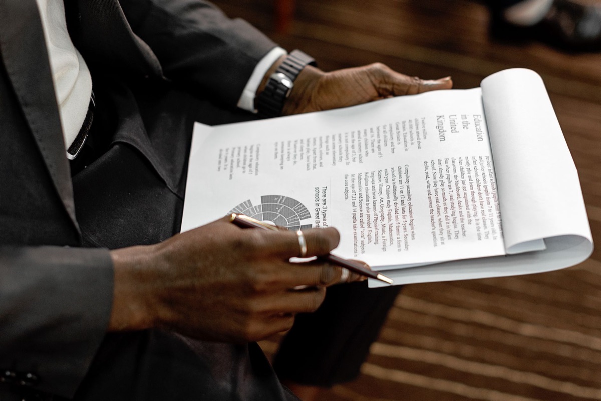 Brits EU relations politician holding document