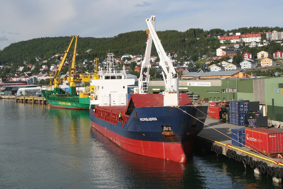 container ship loading cargo at uk port